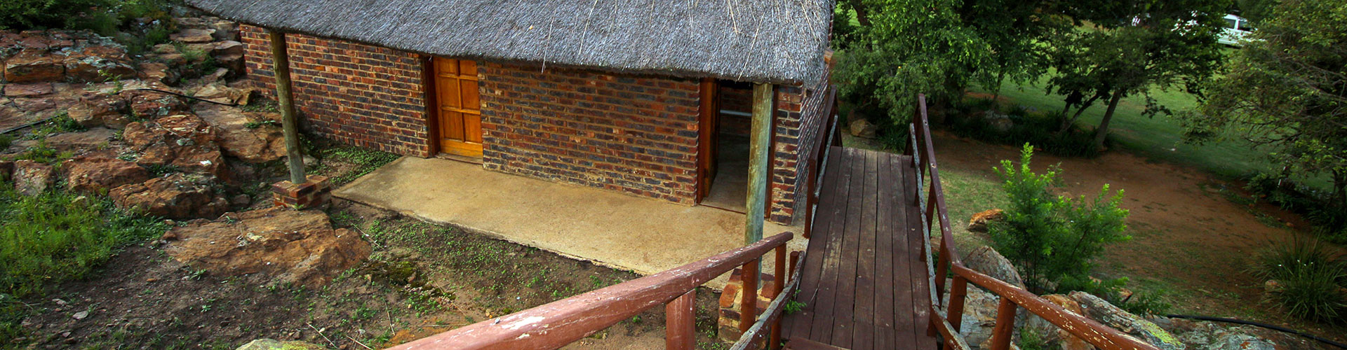 Thatched accommodation and timber walkway